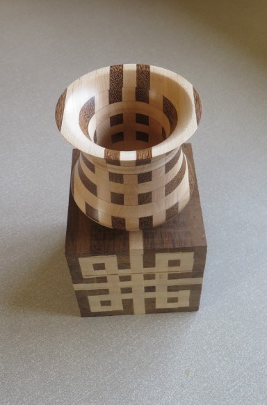 This segmented pot with a blank if could have been turned from won a commended certificate for Ted Hogben